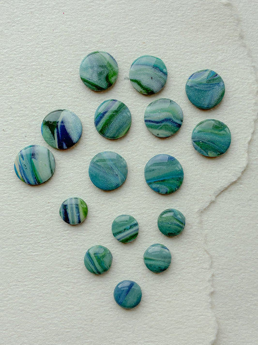 DOTS ørestikker // unika grøn