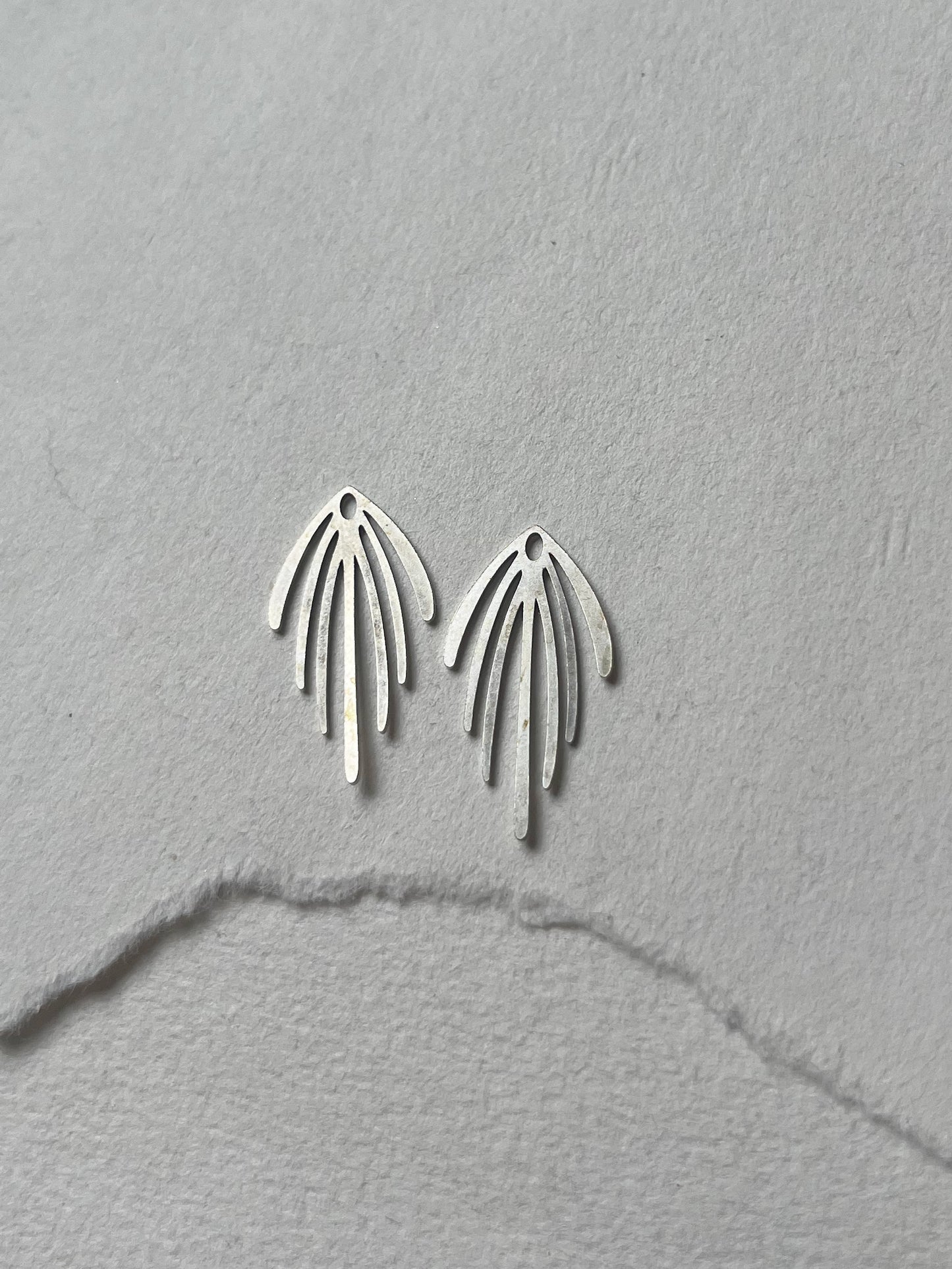 Bagstykker // lang frynse stål