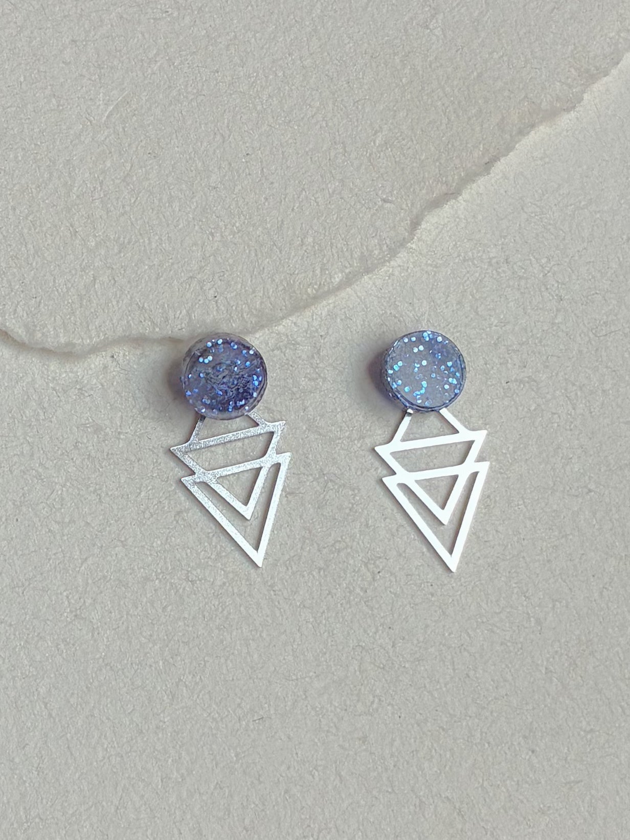 Blå glitter Dot/// stål bagstykke