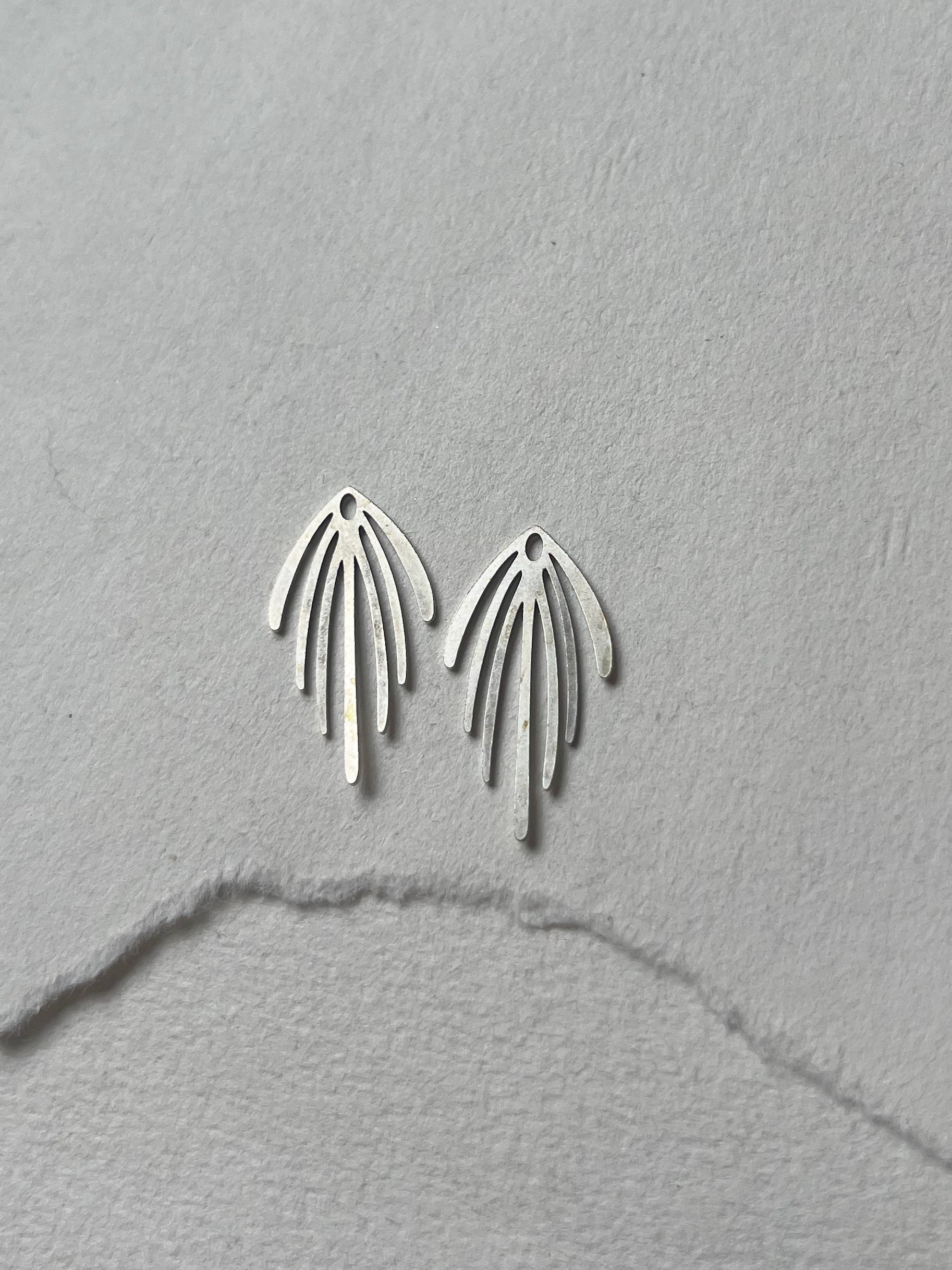 Bagstykker // lang frynse stål